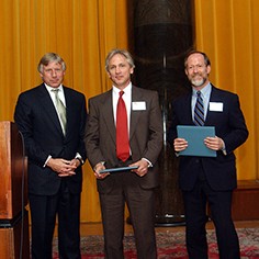 Lee Bollinger, Kevin Helliker and Thomas M. Burton