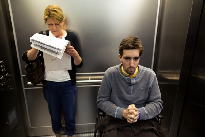 His mother, Patty, took time off work as a waitress to attend to him and navigate the paperwork associated with his treatment. She was responsible for getting him to appointments which were scattered across Boston. Here, he is late for an appointment to discuss different prosthetic leg options. (Josh Haner, The New York Times - May 15,2013)