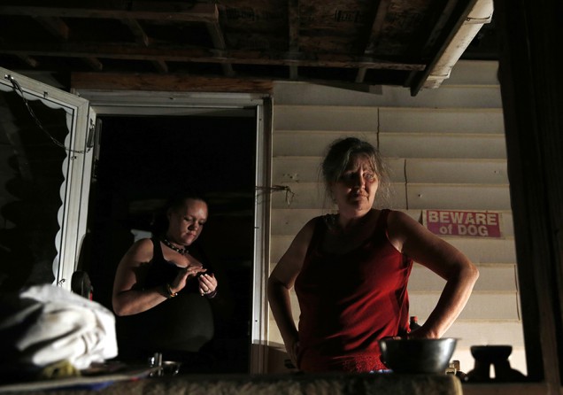 On the night of the eviction, Lanette and her son's fiancée Ashly take a break from packing up the family's belongings. As the night goes on it becomes clear that they are not going to be able to take all of their possessions with them (Jessica Rinaldi, The Boston Globe).