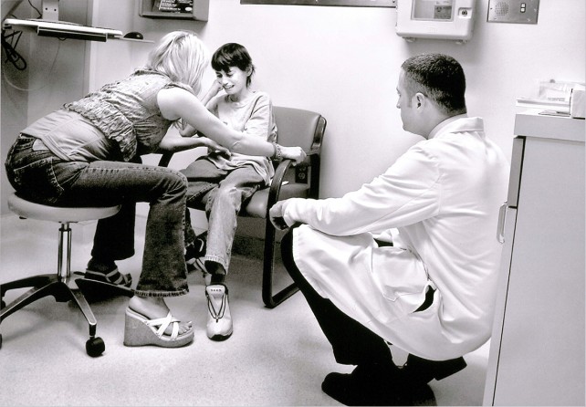 Derek is tearful as Cyndie tries to reason with him at the UC Davis Cancer Center on Feb. 14, 2006. She and Dr. William Hall argue that Derek should have a series of radiation treatments to shrink tumors spreading throughout his body and alleviate his pain. "Derek, you might not make it if you don't do this," Cyndie tells her son. Derek fires back: "I don't care! Take me home. I'm done, Mom. Are you listening to me? I'm done."