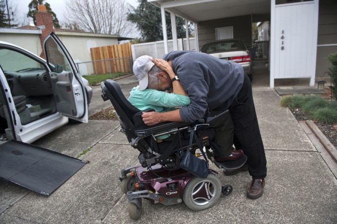 Don Hatfield is caught up in emotion as he thanks Neilann Martinez, of Yountville, who suffers from polio, for delivering him a specially made meal along with his Yountville newspaper, stickers for his grandchildren and a gift certificate. (April 6, 2012)