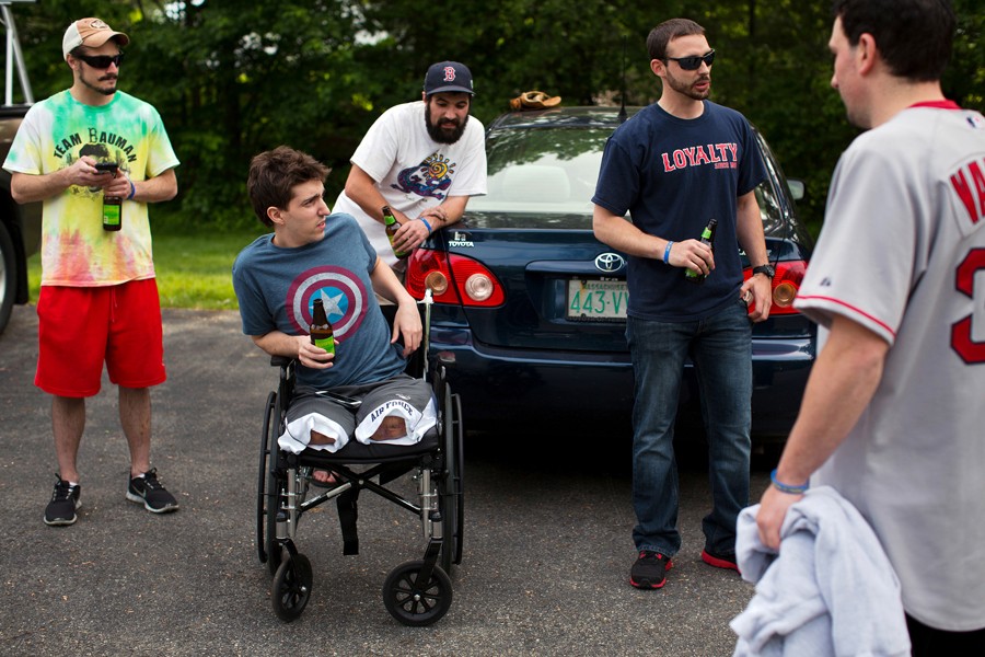 Hanging out with friends, who were wearing bracelets with the words 'Bauman Strong' on one side and 'April 15, 2013' on the other. (Josh Haner, The New York Times - May 28, 2013)