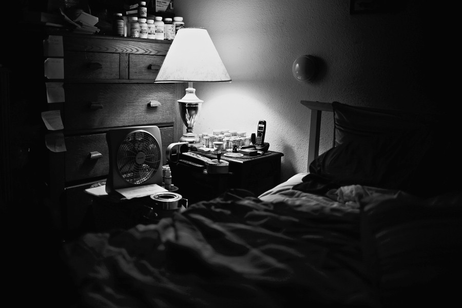 Pill bottles line a dresser and a nightstand in a San Diego home, a scene familiar to many households in which prescription drug addiction has taken hold. (December 31, 2012)