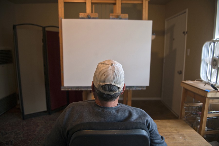 Don Hatfield takes a moment to study the blank canvas on which he will begin his first painting since his daughter Rachel's death in February.(April 6, 2012)