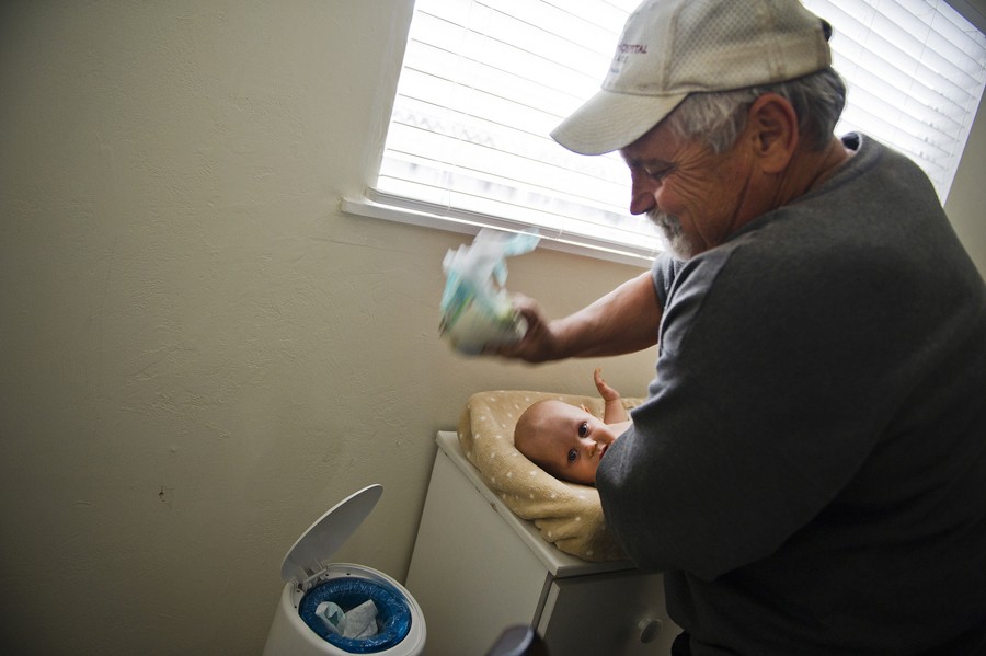 Don Hatfield changes Alex's diaper and has become more comfortable with the daily routine of parenting.(May 16, 2012)