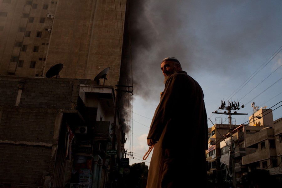 Smoke rising from a high-rise that included offices for media in Gaza that was struck by an Israeli bomb. (November 26, 2012)