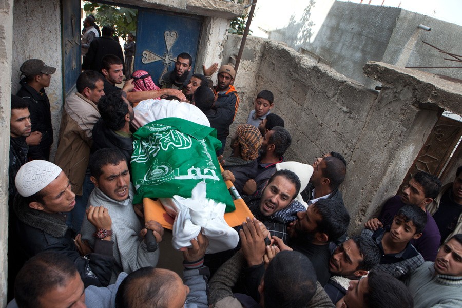 A funeral for three men killed in an Israeli airstrike on Gaza. (November 17, 2012)